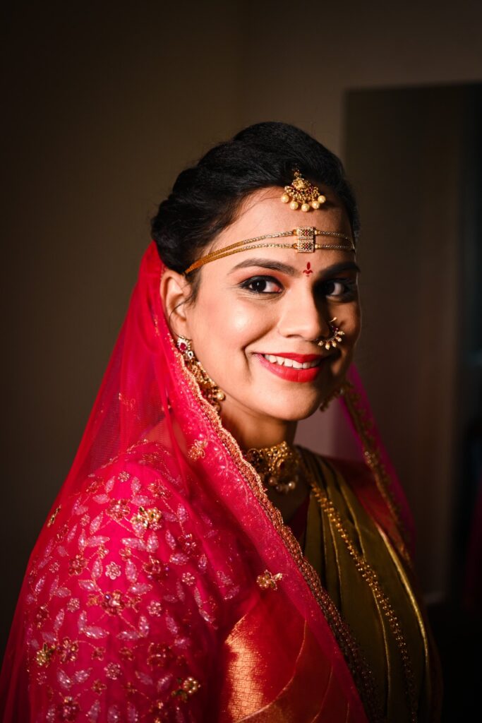 Authentic Telugu bride with a blush & fine make up during her wedding ceremony ,Captured by Framesflow photography in Hyderabad