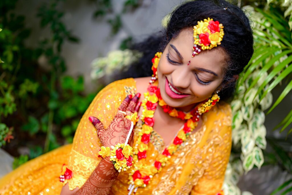 The Telugu bride ready to her Haldi occasion with the shining look captured by Framesflow photography in Hyderabad