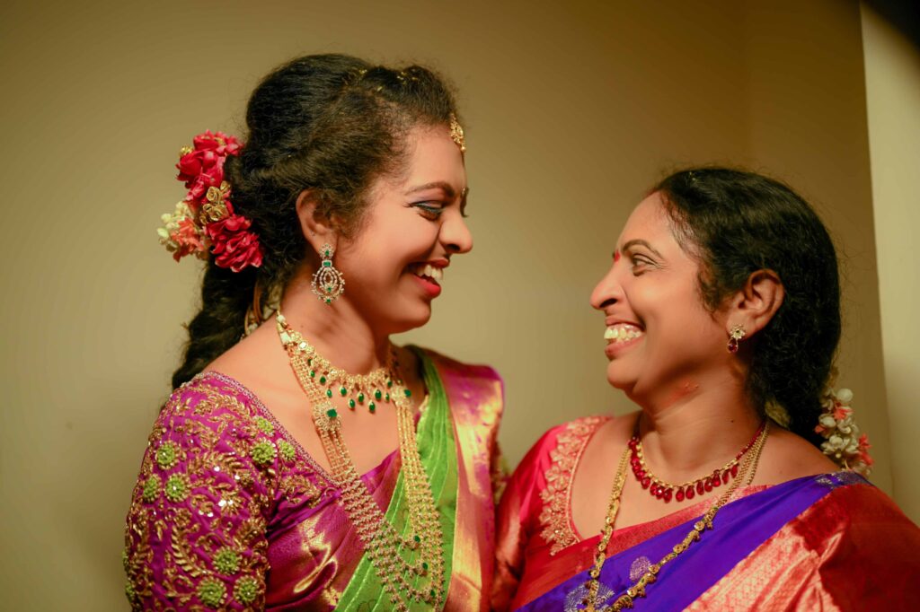 Telugu bride and her mother looks happily together on her wedding ceremony in Hyderabad