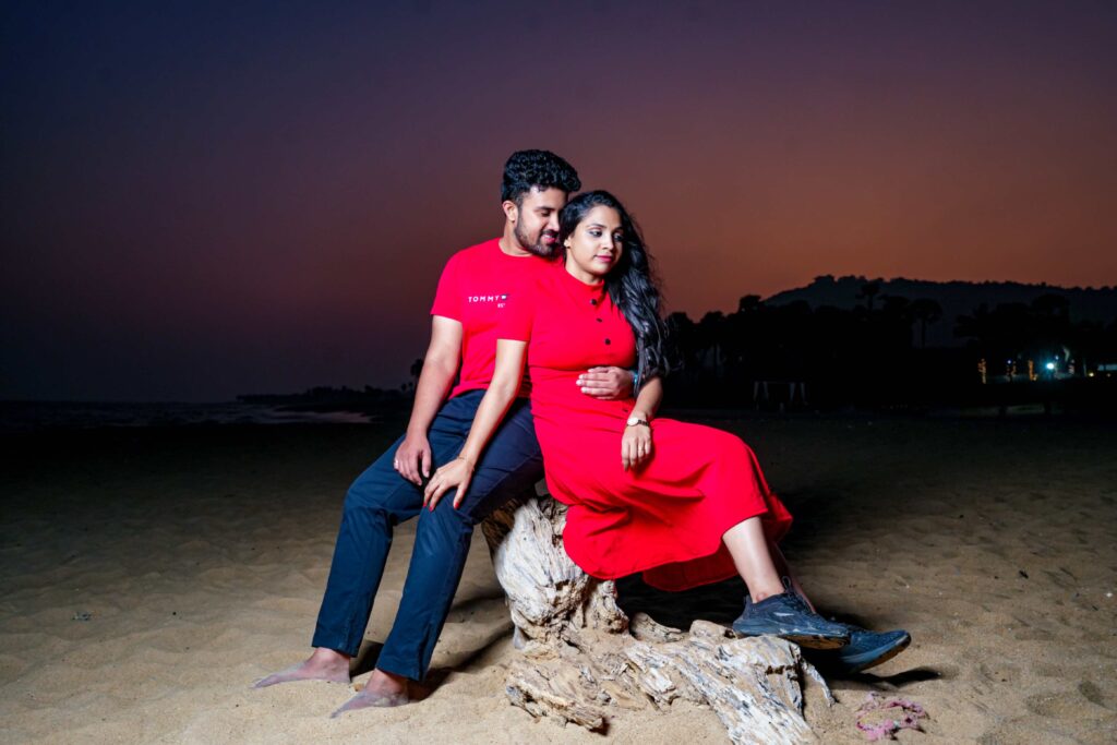 A beautiful Telugu groom's hand gently placed on the bride's waist, capturing a tender moment during their pre wedding shoot by Framesflow photography in Hyderabad.