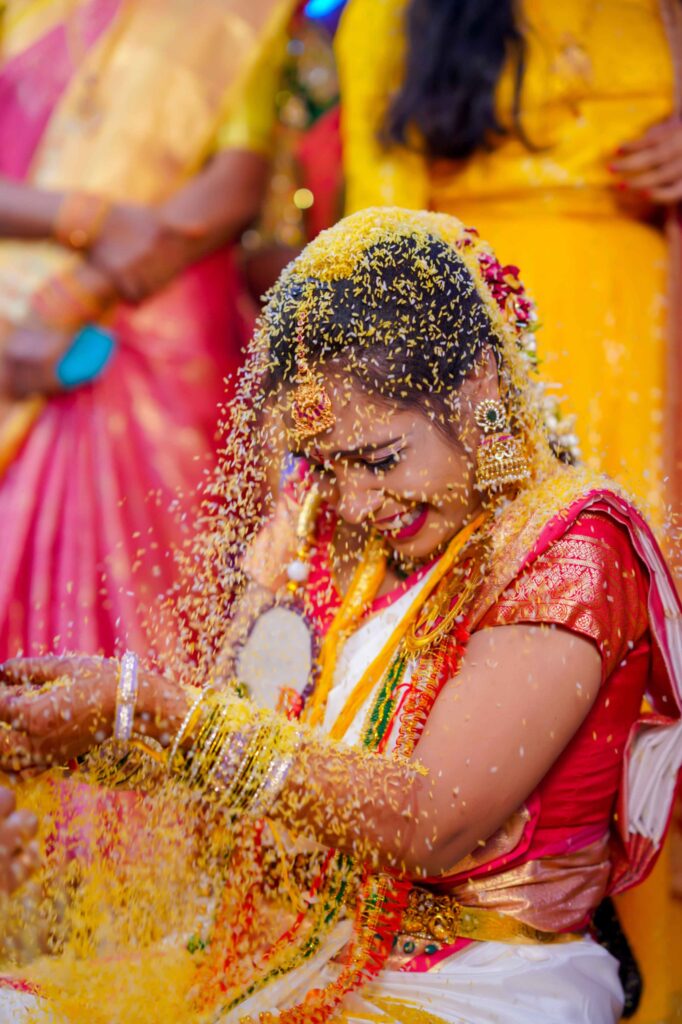 The Telugu bride feeling excited, they follows traditional rituals and enjoying a lot,captured by Framesflow photography in Hyderabad.